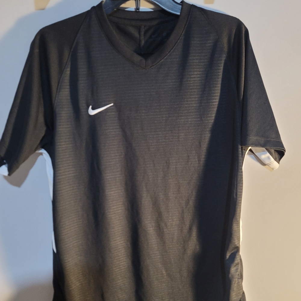 Nike soccer tshirt size large black and white